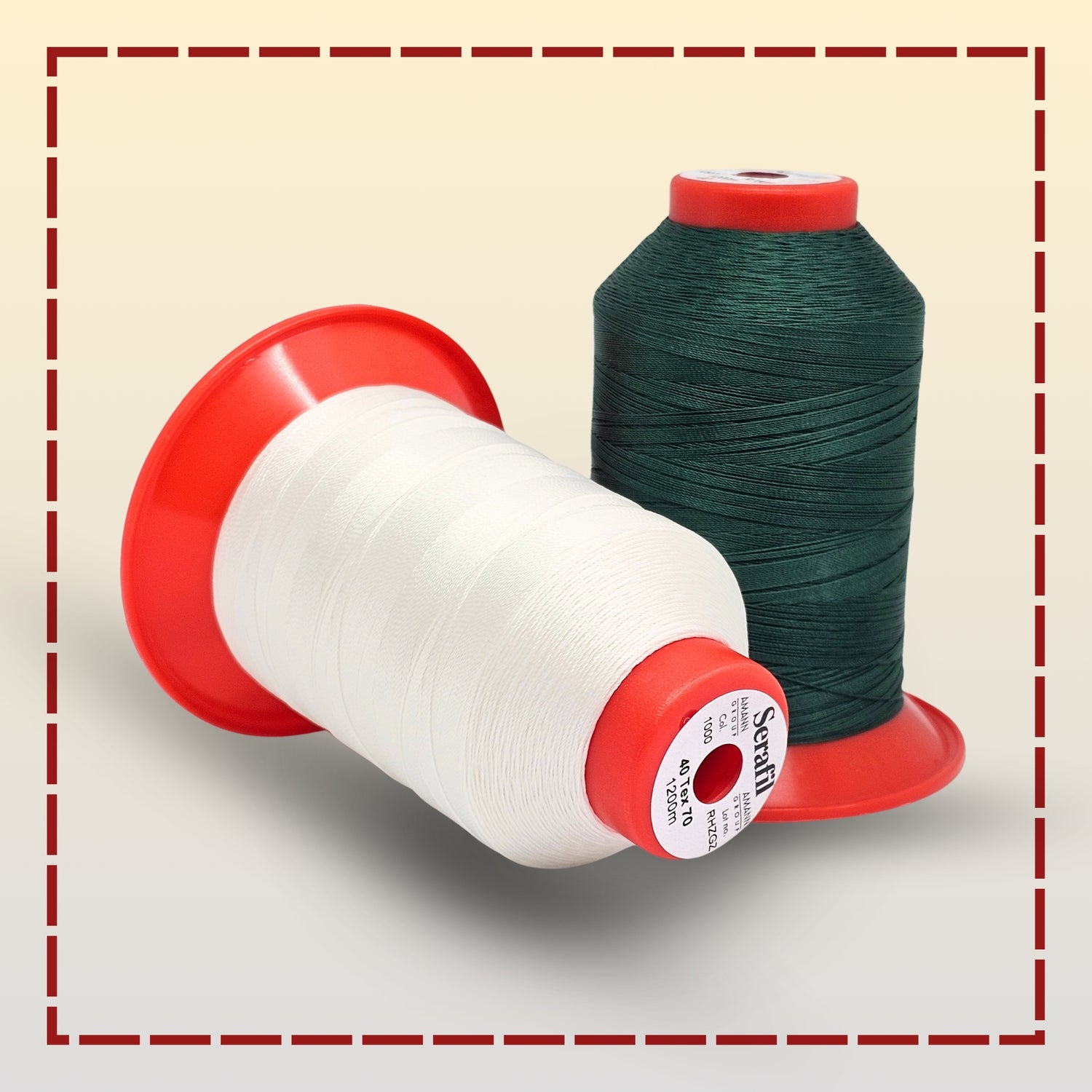 Two spools of thread, one white and one green, on a light gray background.